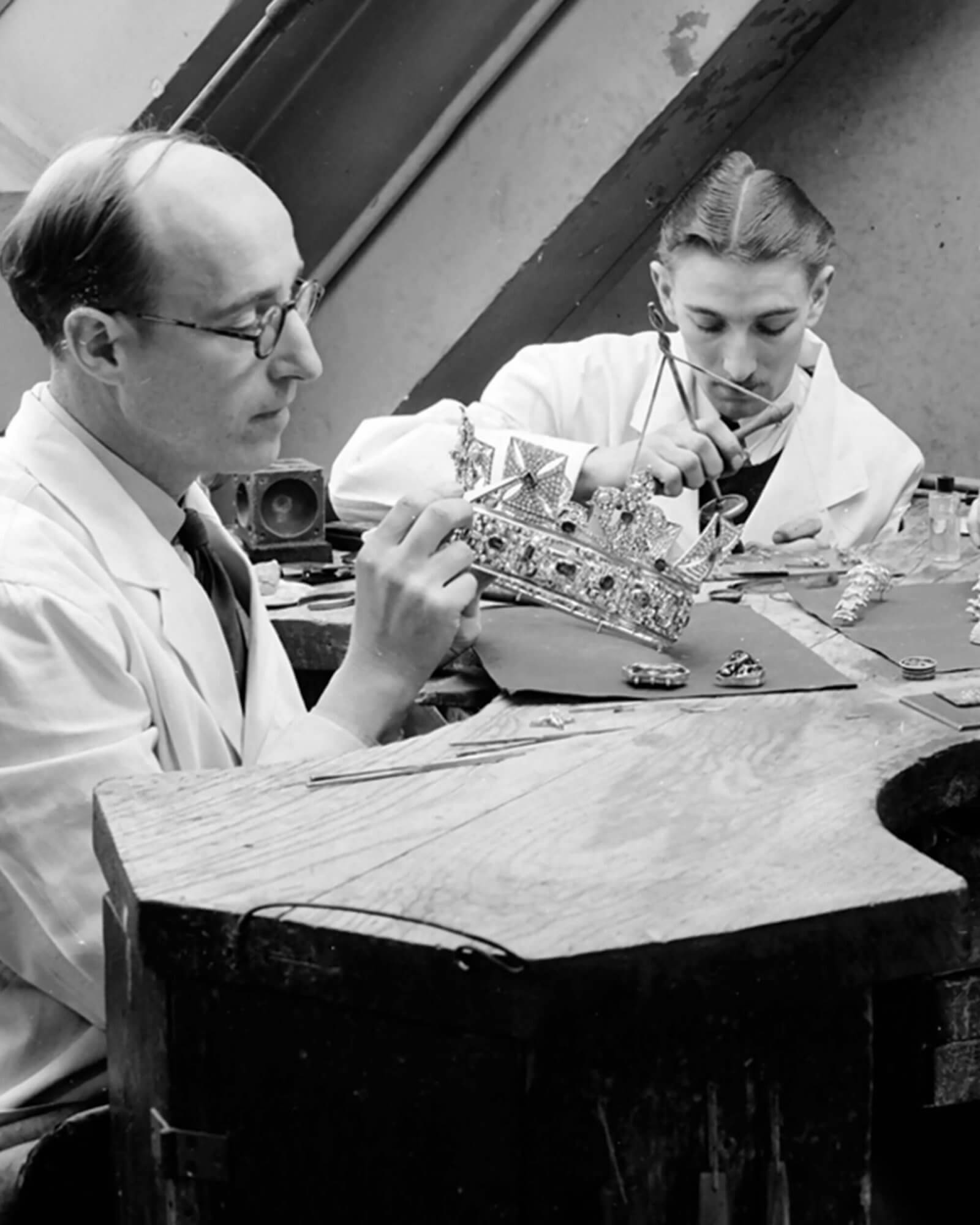 a Garrard crafstman resizing a Crown for Queen Elizabeth II coronation in 1953