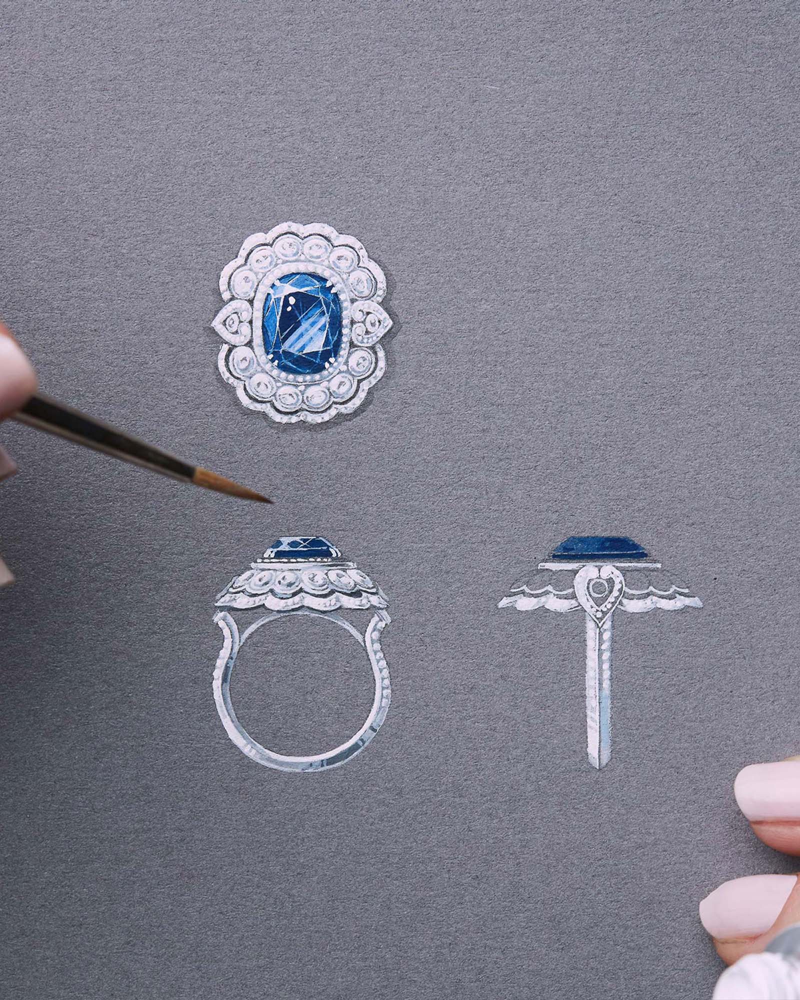 a Garrard jewellery designer skethcing a bespoke sapphire Garrard engagement ring on gouache paper 1