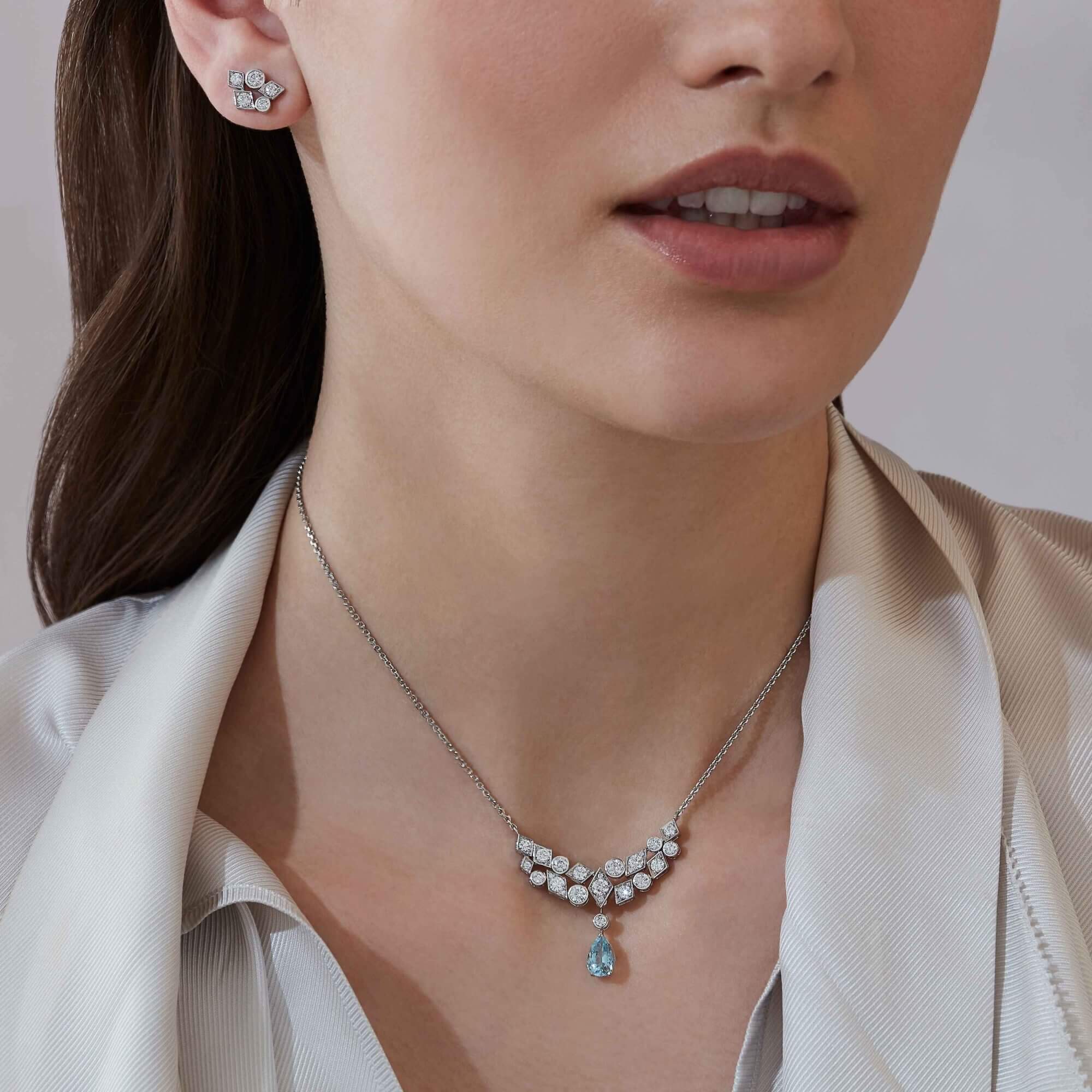 Garrard Albemarle Abstract jewellery Collection transformable diamond necklace in 18ct white gold 2017419 and earrings on Model