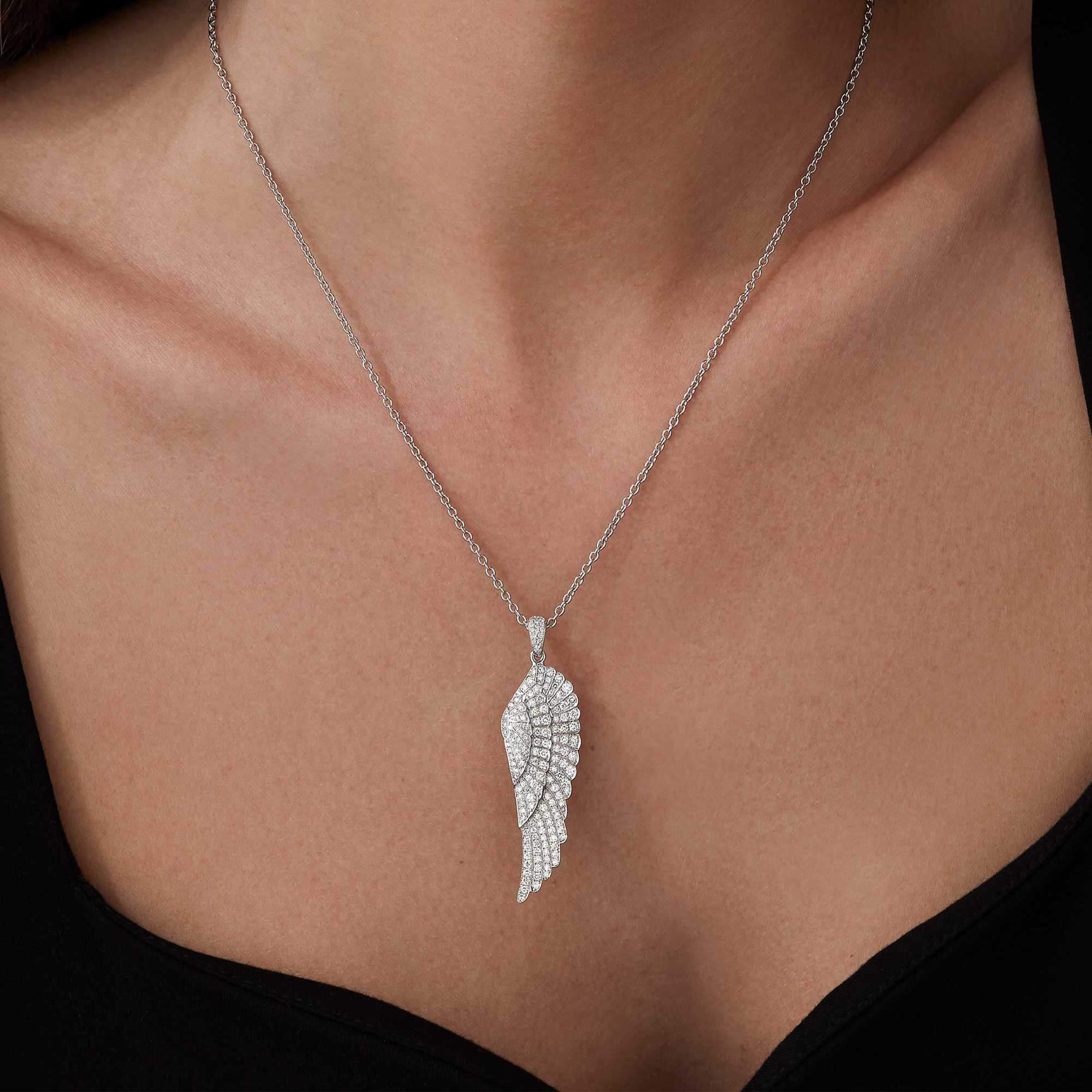 Garrard Wings Classic jewellery collection Diamond Pendant In 18ct White Gold, 2008168, and earrings 2013181, on model