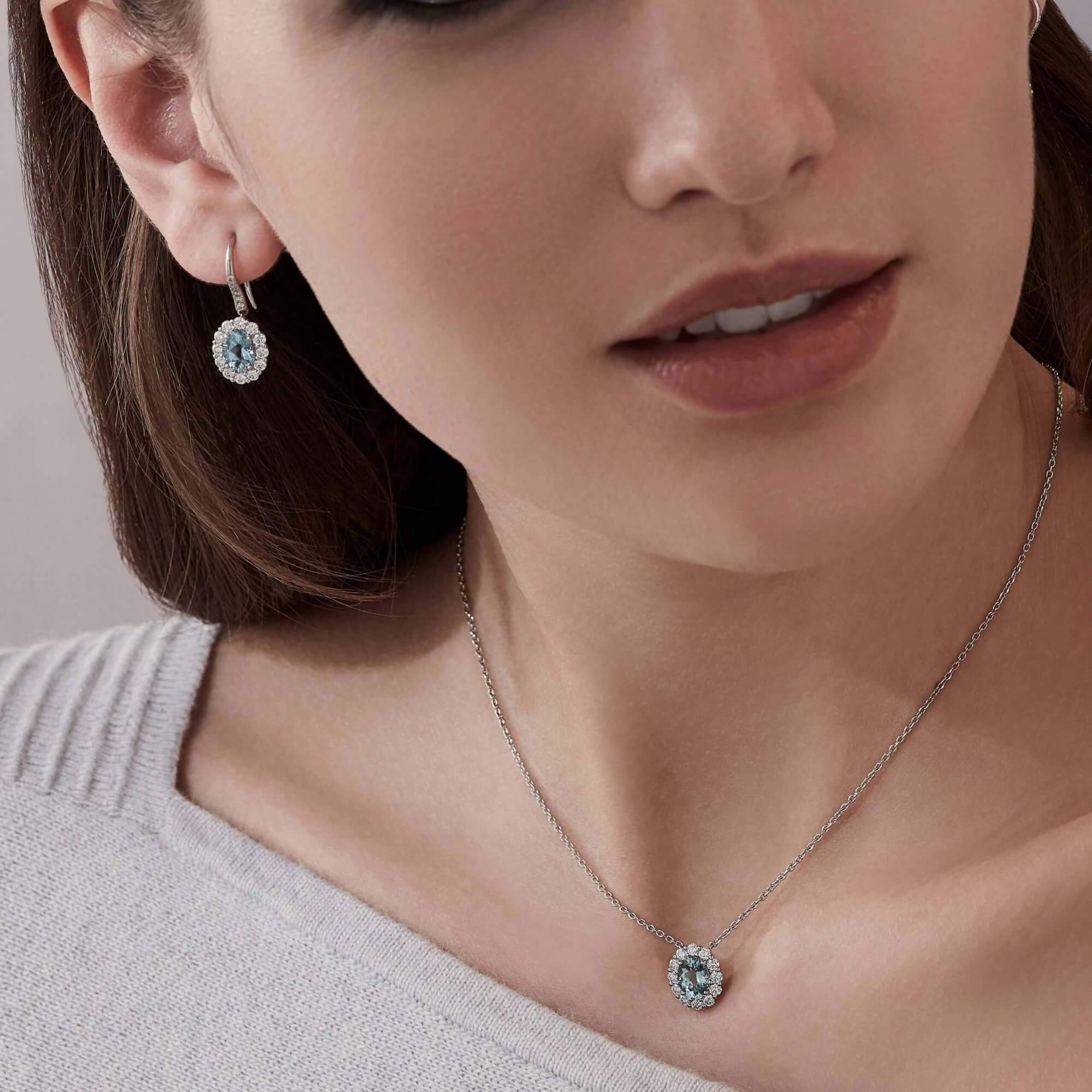 Garrard 1735 collection Aquamarine Oval Drop Earrings in platinum with Diamonds JE17PT13 and pendant On Model 1