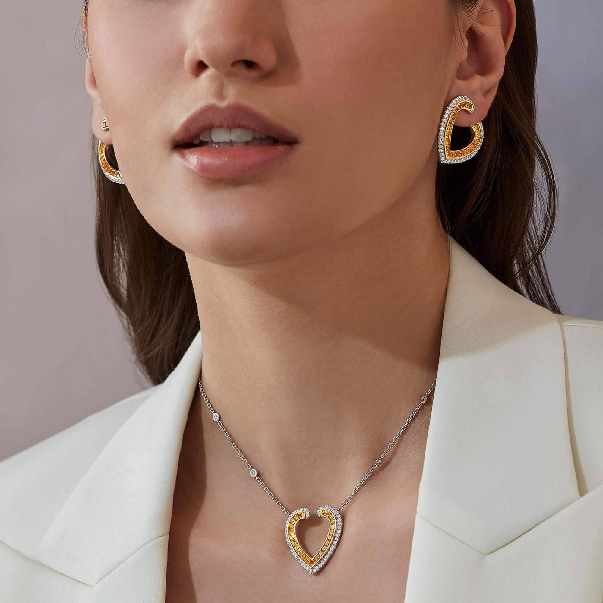 Garrard Aloria jewellery collection calibre cut Yellow sapphire pendant in 18ct white gold with diamonds 2016942 earrings 2016944On Model