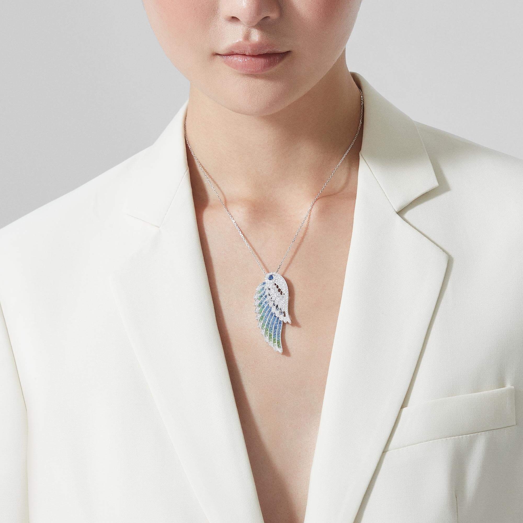 Garrard Wings Jewellery Collection Embrace Peacock Slide Pendant with Diamonds, Sapphires, Tsavorites and Aquamarines, 2017610, Model Female