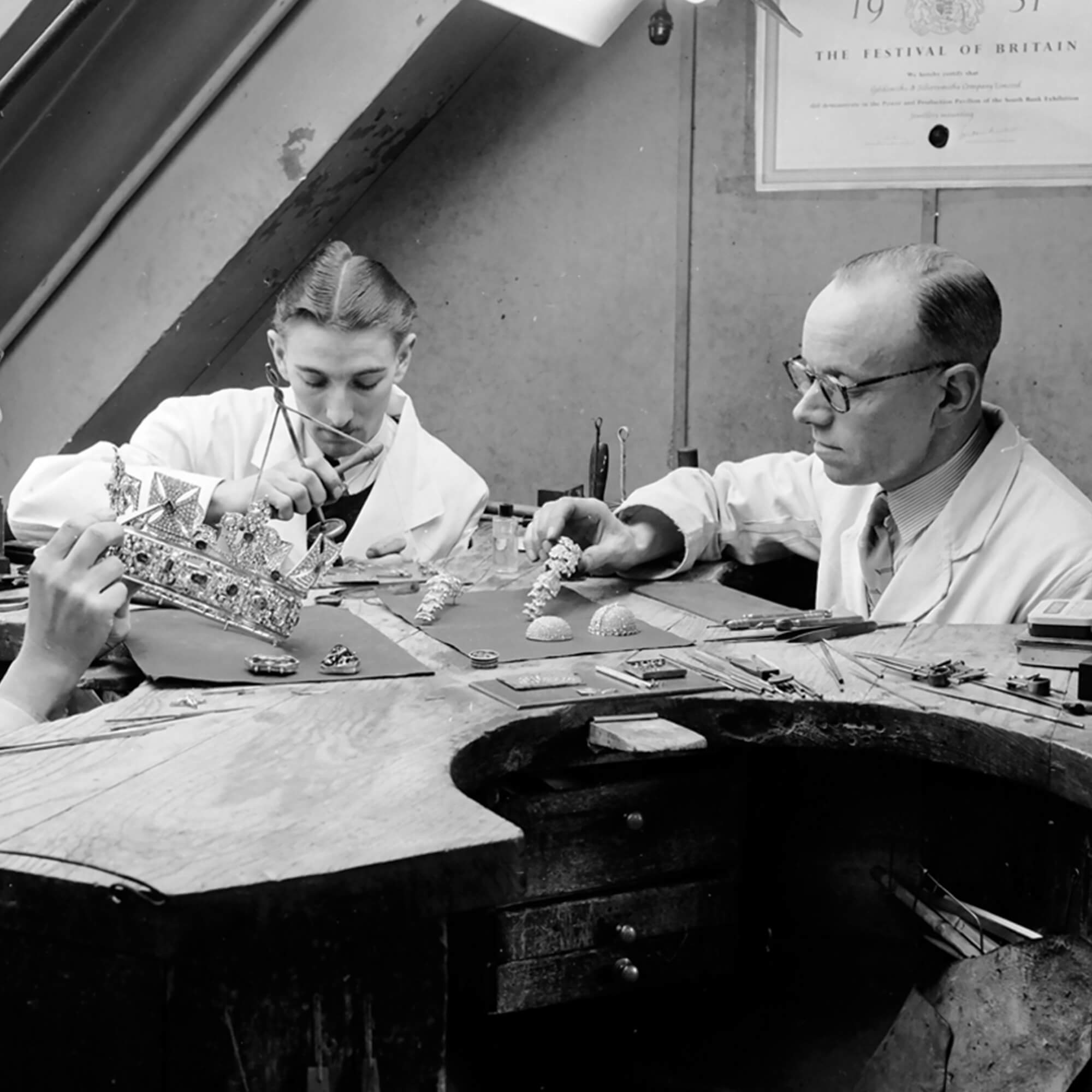 an image of Garrard craftsmen crafting jewellery in the Garrard workshop in 1951