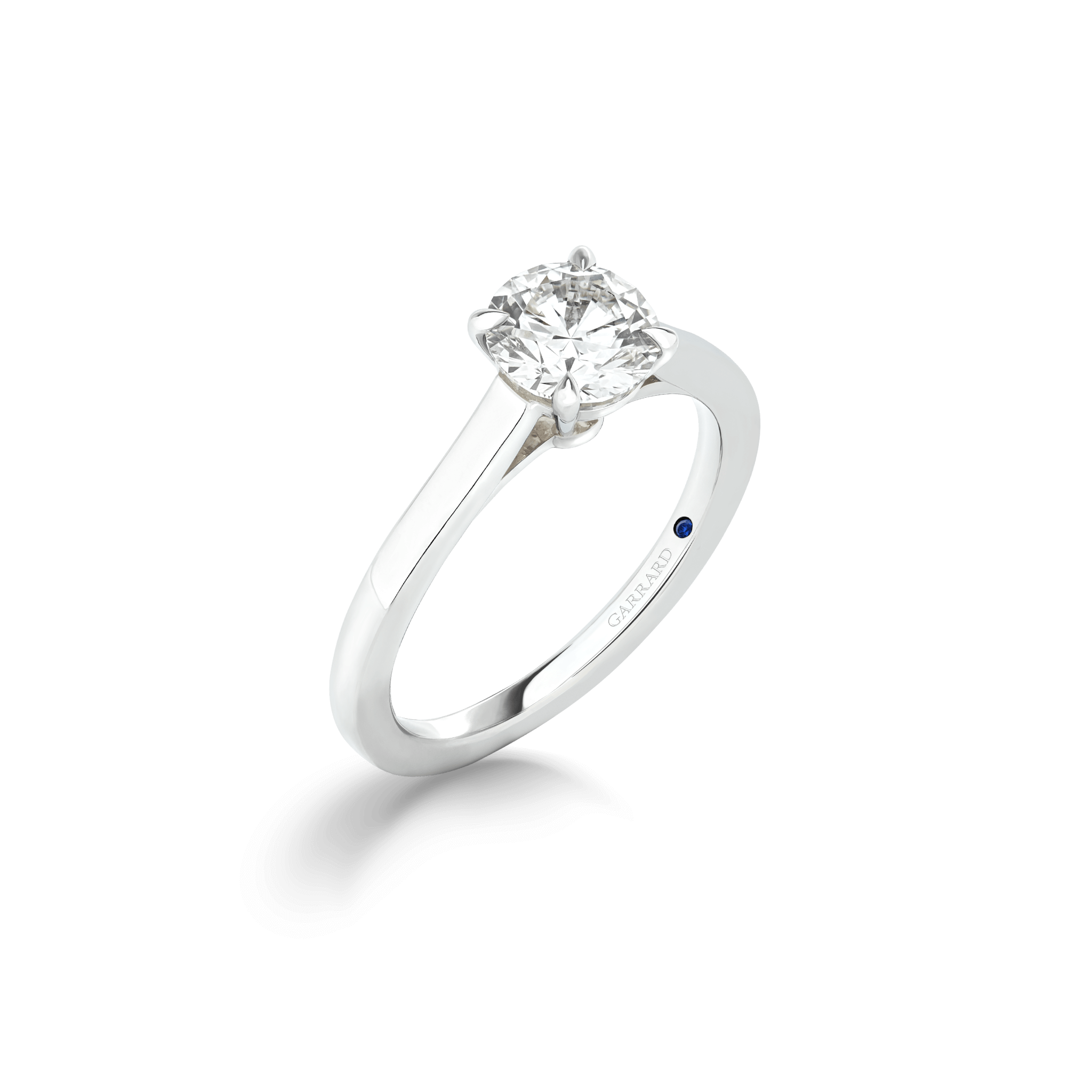 cherish-round-brilliant-diamond-solitaire-engagement-ring-in-platinum-with-diamonds-garrard