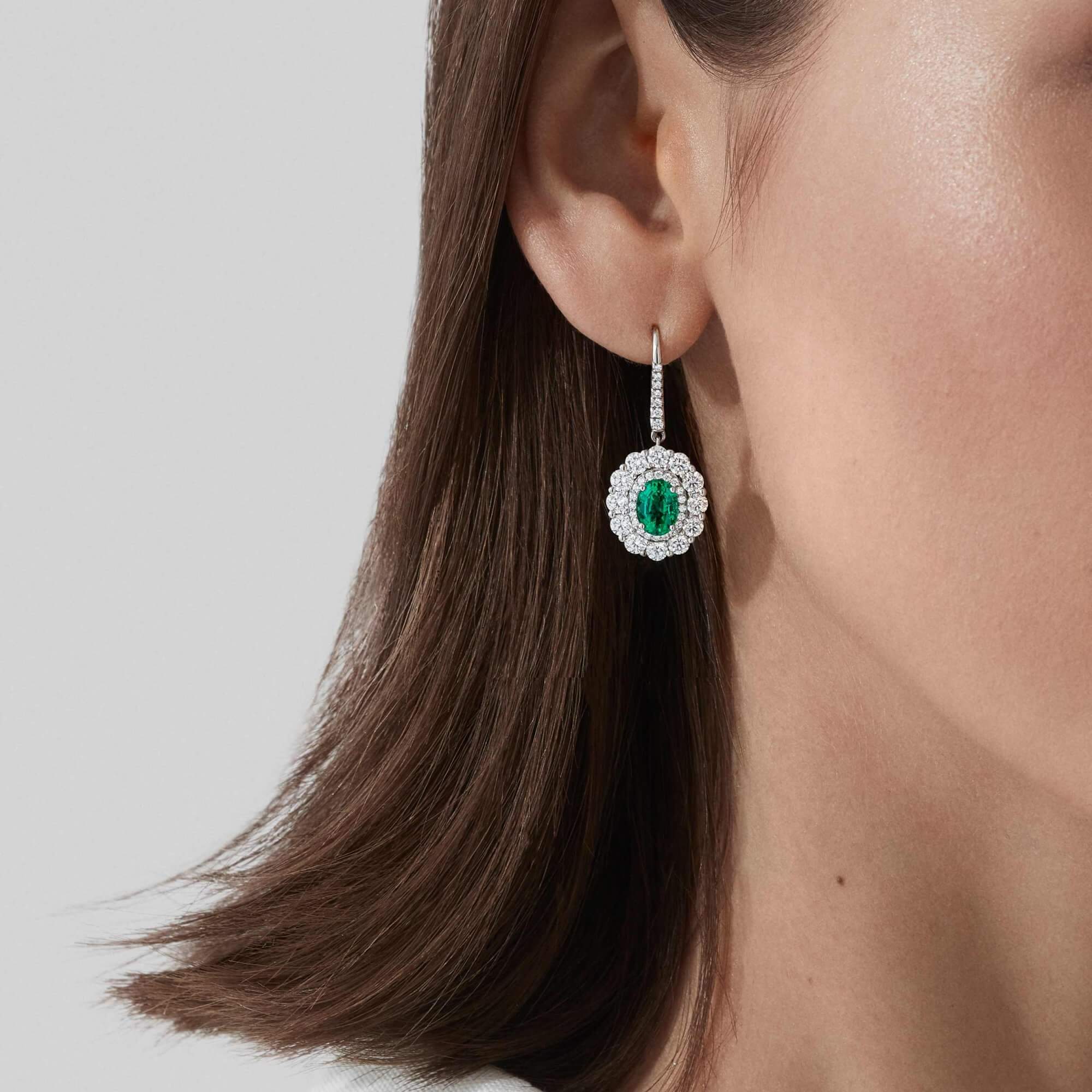 Garrard 1735 collection Double Cluster Emerald Oval Drop Earrings in platinum with diamonds JE17PT14 Model View
