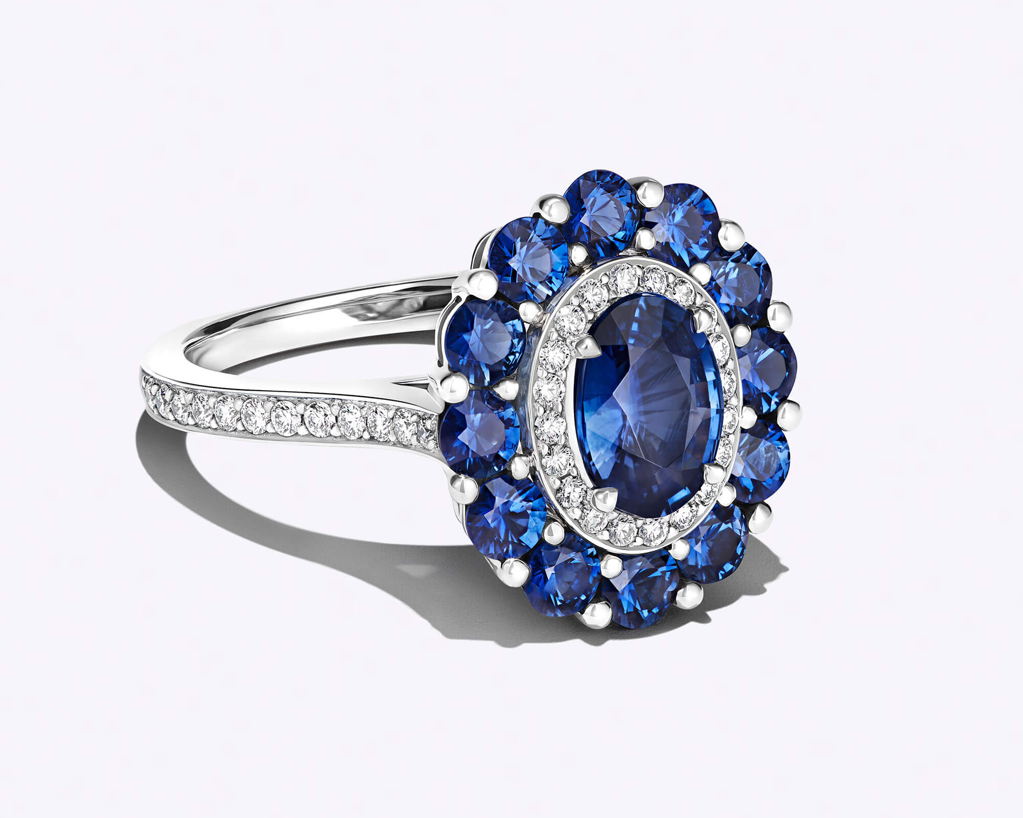 Garrard 1735 colour cluster sapphire and diamond ring, inspired by princess diana's famous sapphire engagement ring
