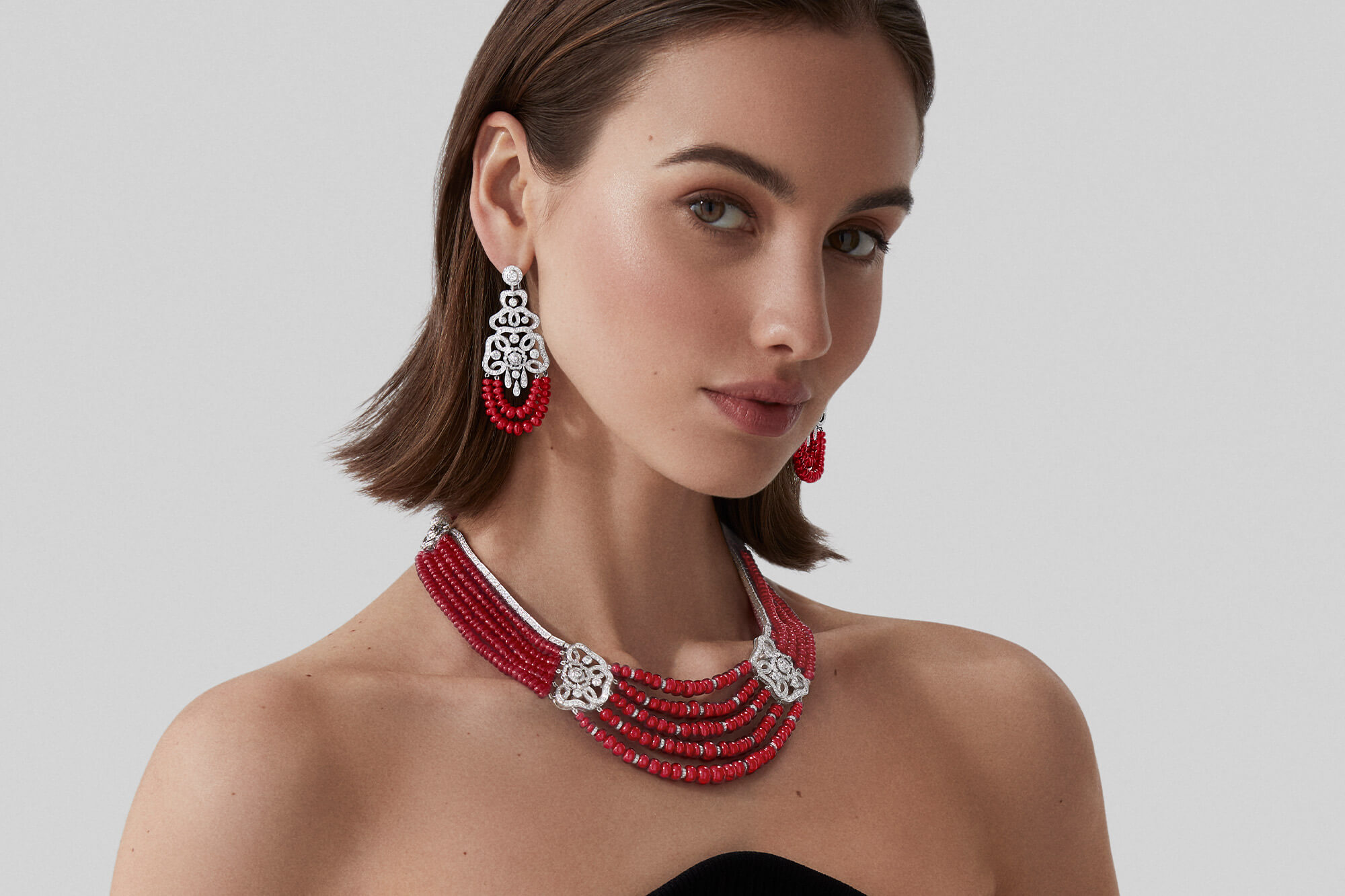 Model wears Garrard high jewellery collection Red Rose High Jewellery Suite menu 2023 1