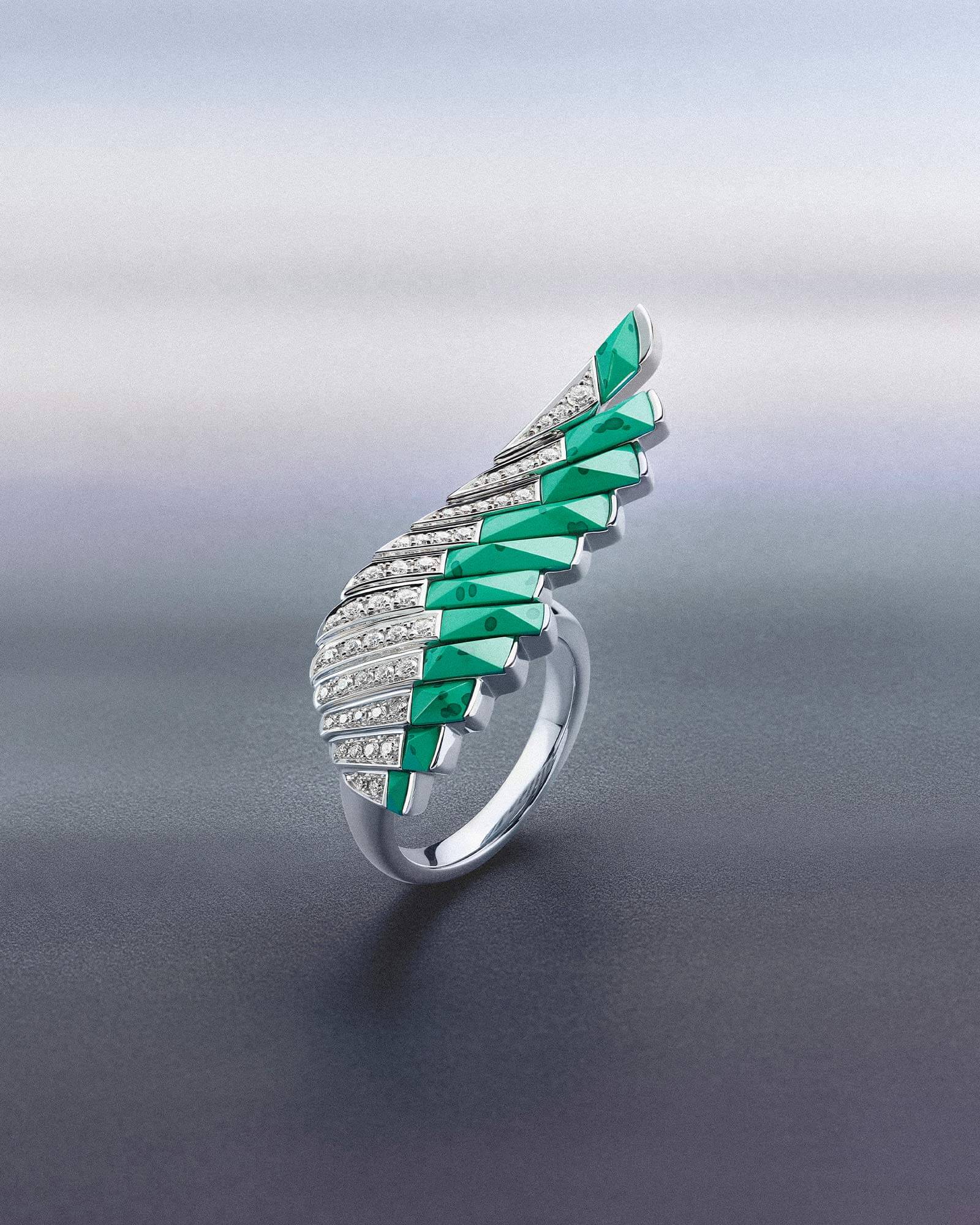 Close up of a Garrard Wings Rising Apple Malachite and Diamond Ring In 18ct White Gold