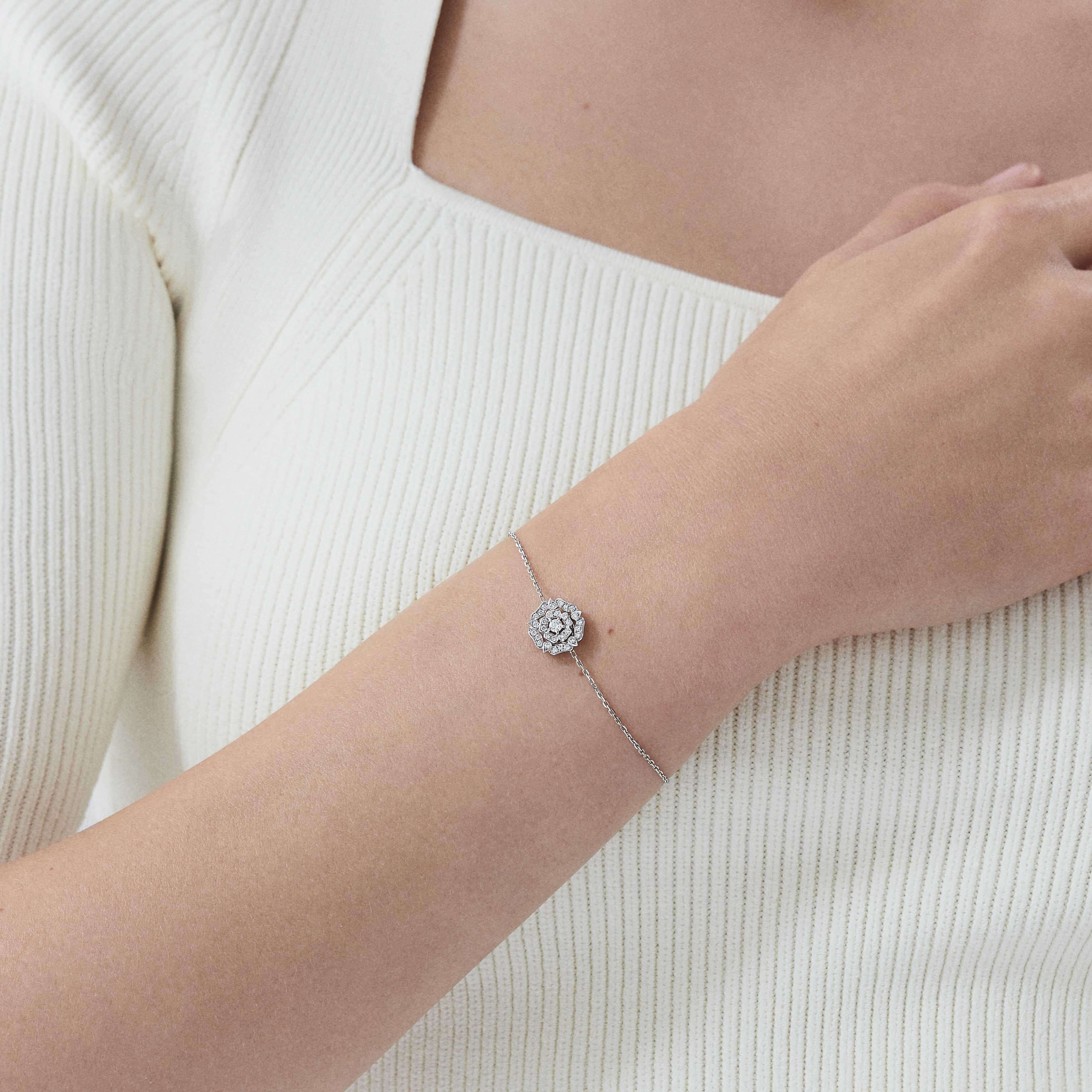 Garrard Mini Icons collection Tudor Rose Bracelet in 18ct White Gold with Diamonds 2012432 on model Garrard Mini Icons collection Tudor Rose Bracelet in 18ct White Gold with Diamonds 2012432 on model