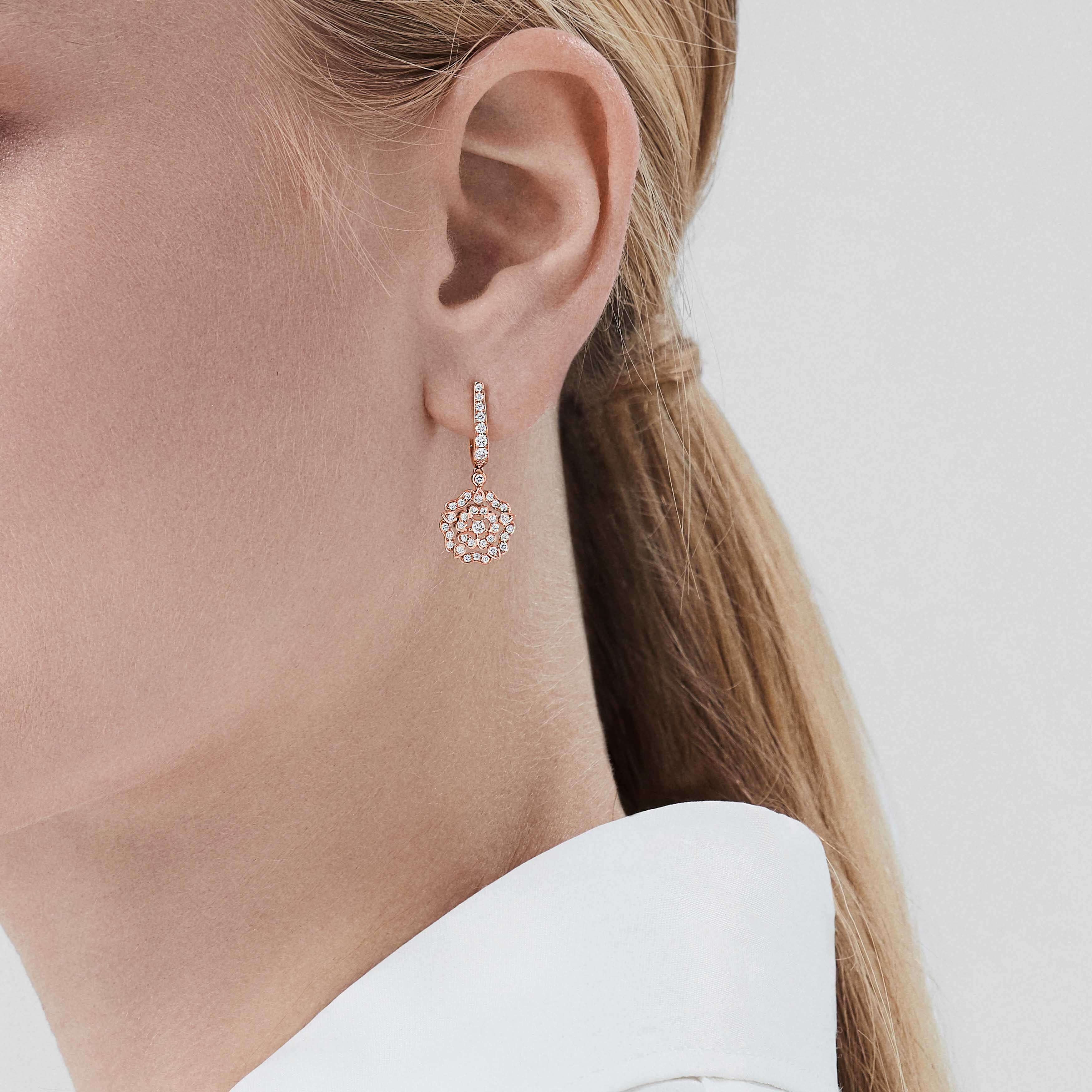 Garrard Mini Icons collection Tudor Rose Earrings in 18ct White Gold with Diamonds 2012639 On Model Garrard Mini Icons collection Tudor Rose Earrings in 18ct Rose Gold with Diamonds 2012639 On Model