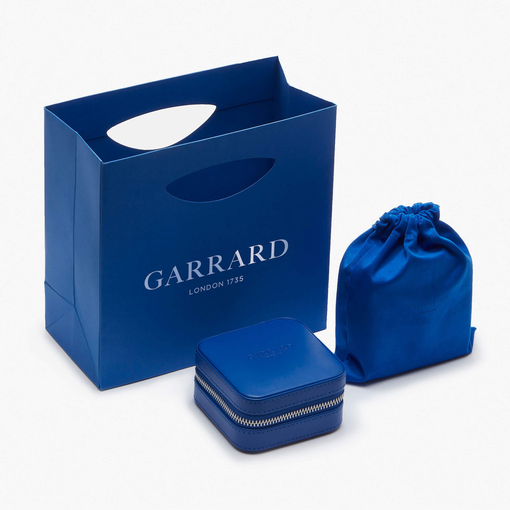 Garrard sustainable Royal Blue jewellery boxes packaging paper bag and dust bag