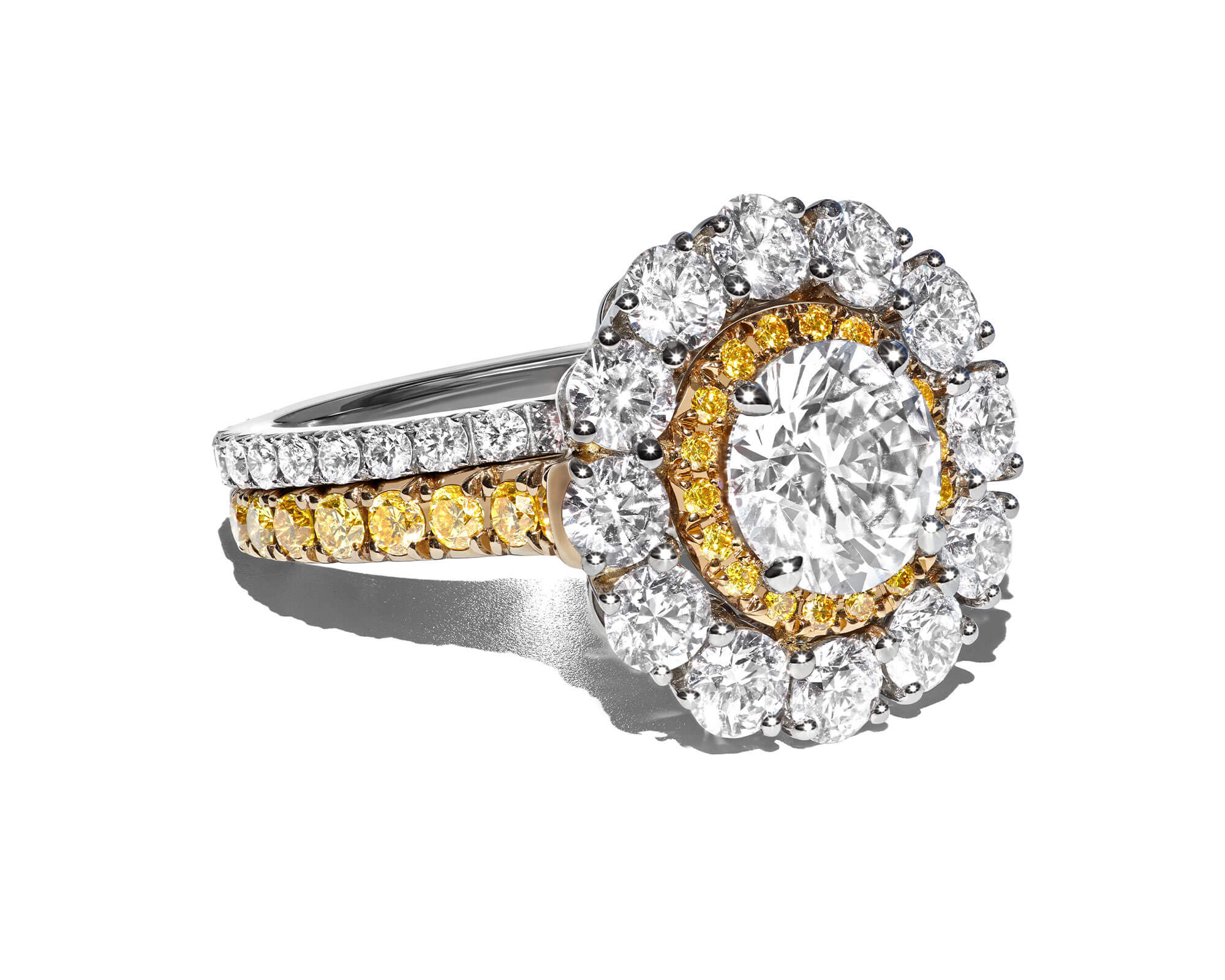 Garrard Harmoney yellow and white diamond engagement ring with diamond wedding band
