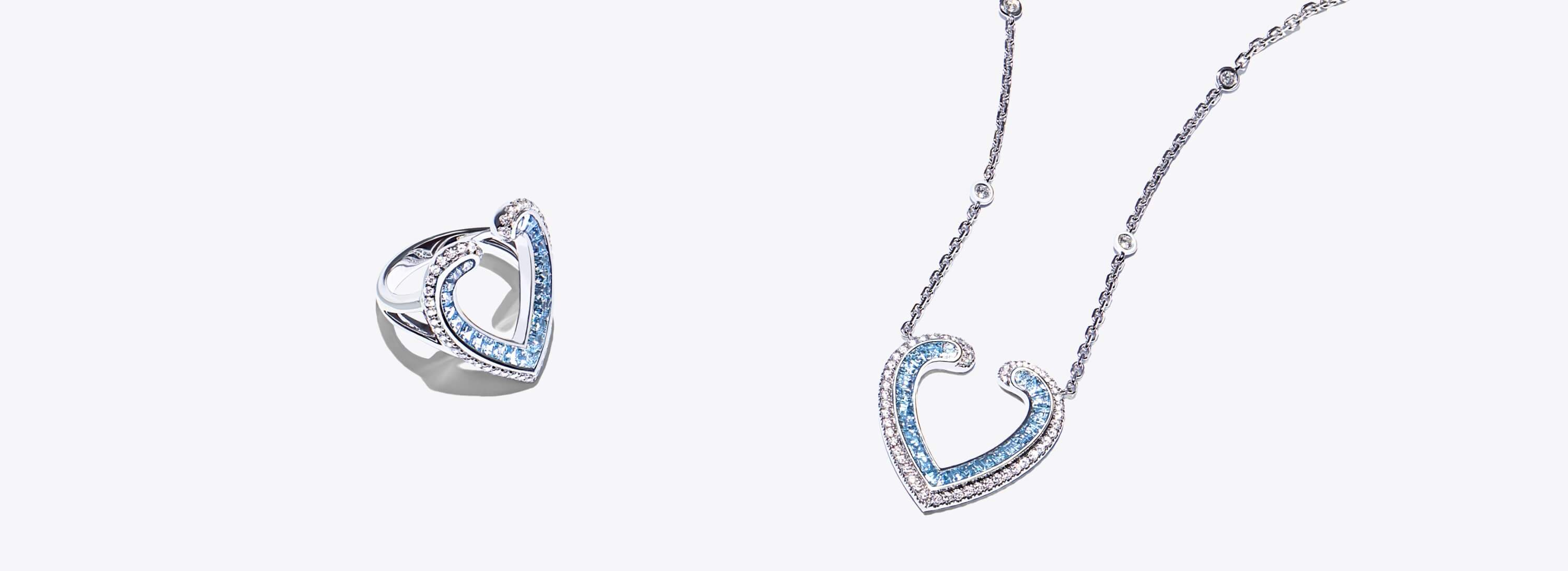 Garrard Aloria jewellery collection Aloria Calibré Cut Aquamarine and Diamond Pendant and Ring PLP banner Desktop