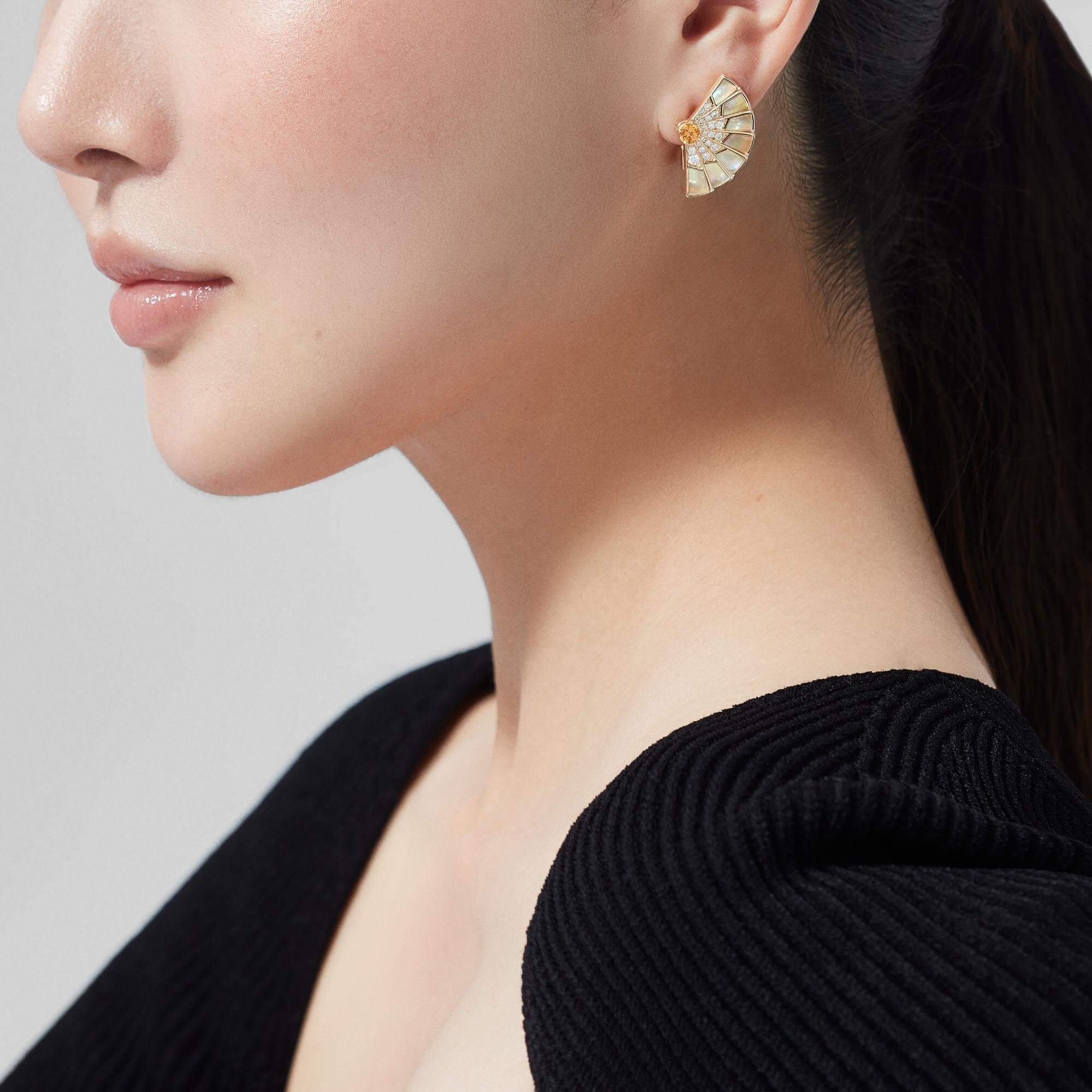 Garrard Fanfare Jewellery Collection Symphony Orange Sapphire and Golden Mother of Pearl Earrings In 18ct Yellow Gold with Diamonds, 2018711, Model